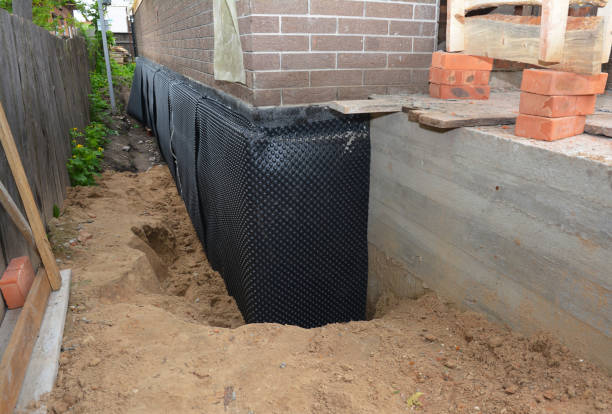 Happy homeowners after waterproofing job in Ashton